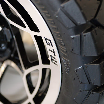 14" Nexus Gloss Black/Silver with 22" Timberwolf A/T (SET OF 4)