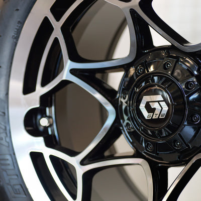 14" Nexus Gloss Black/Silver with 22" Timberwolf A/T (SET OF 4)